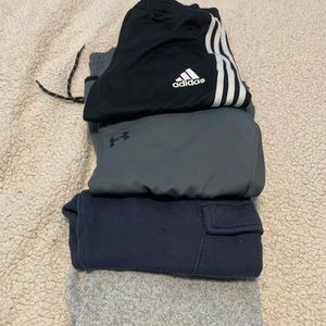 Lot of Mens small joggers. Adidas, under Armour, and two Old Navy pair.